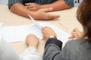 A person reviewing legal documents