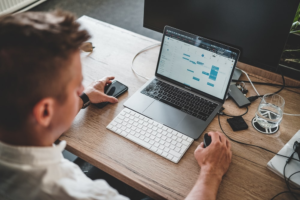 A public accountant checking timesheet 