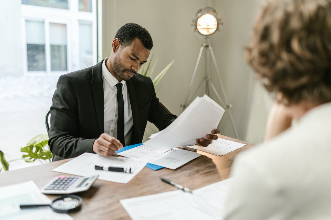 Tax accountant with a client 