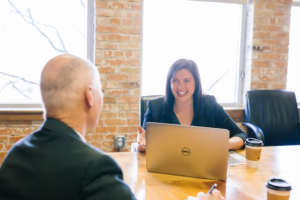 A tax consultant with her client