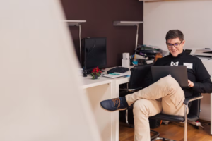 a man using a laptop 