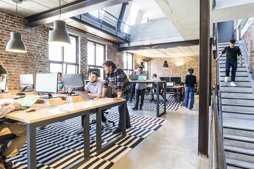A small business office space with employees