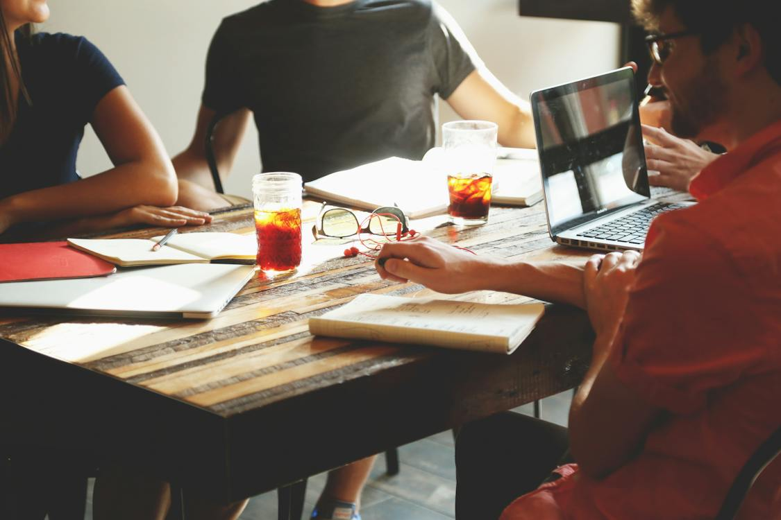 A group of Silicon Valley professionals in a meeting