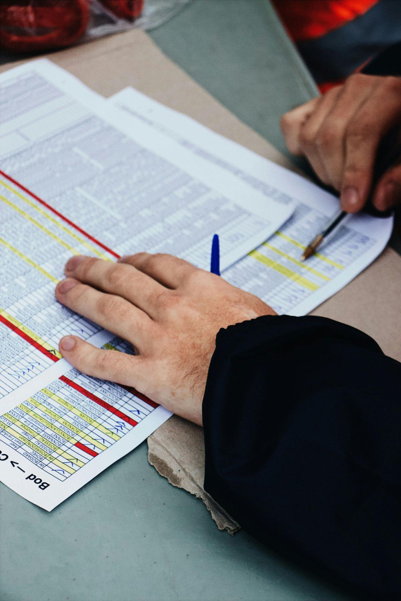 A man flipping through documents