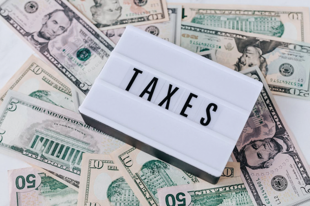 a tax board on top of money