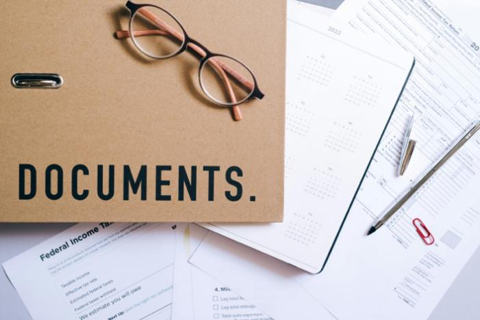  Financial documents and tax records organized on a desk