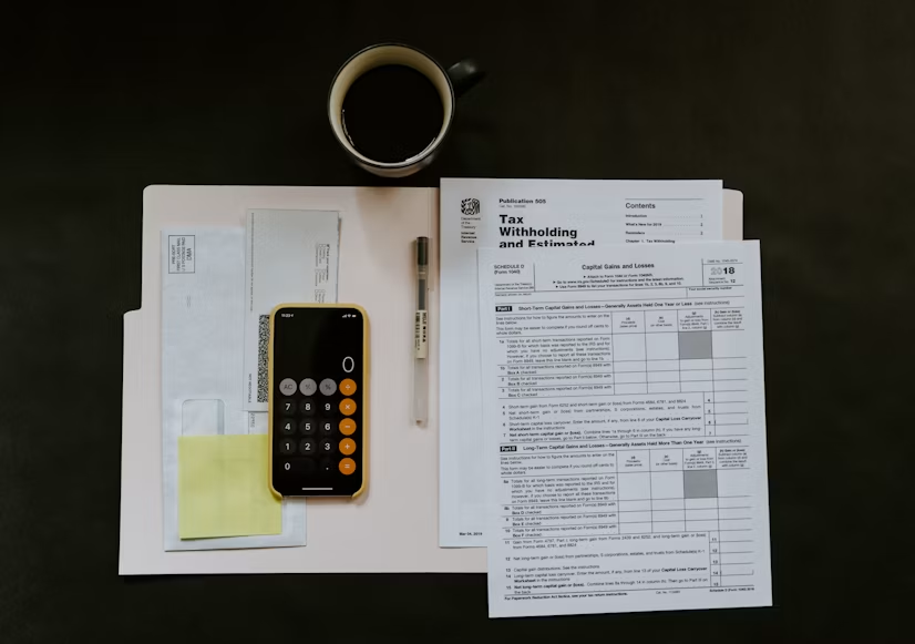 This photo shows some tax documents on a table.