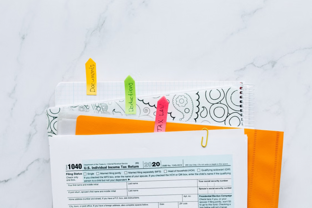 This photo shows some tax documents on a table.